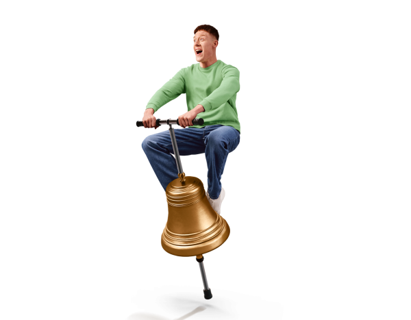 man bouncing on a pogo stick shaped like a bell